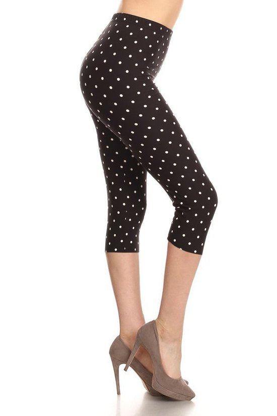 High Waisted Capri Leggings With An Elastic Band In A White Polka Dot Print Over A Black Background - Nil-Chi